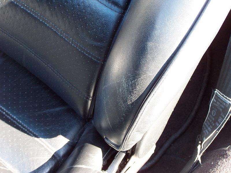 100_2182.JPG - Normal wear on drivers seat